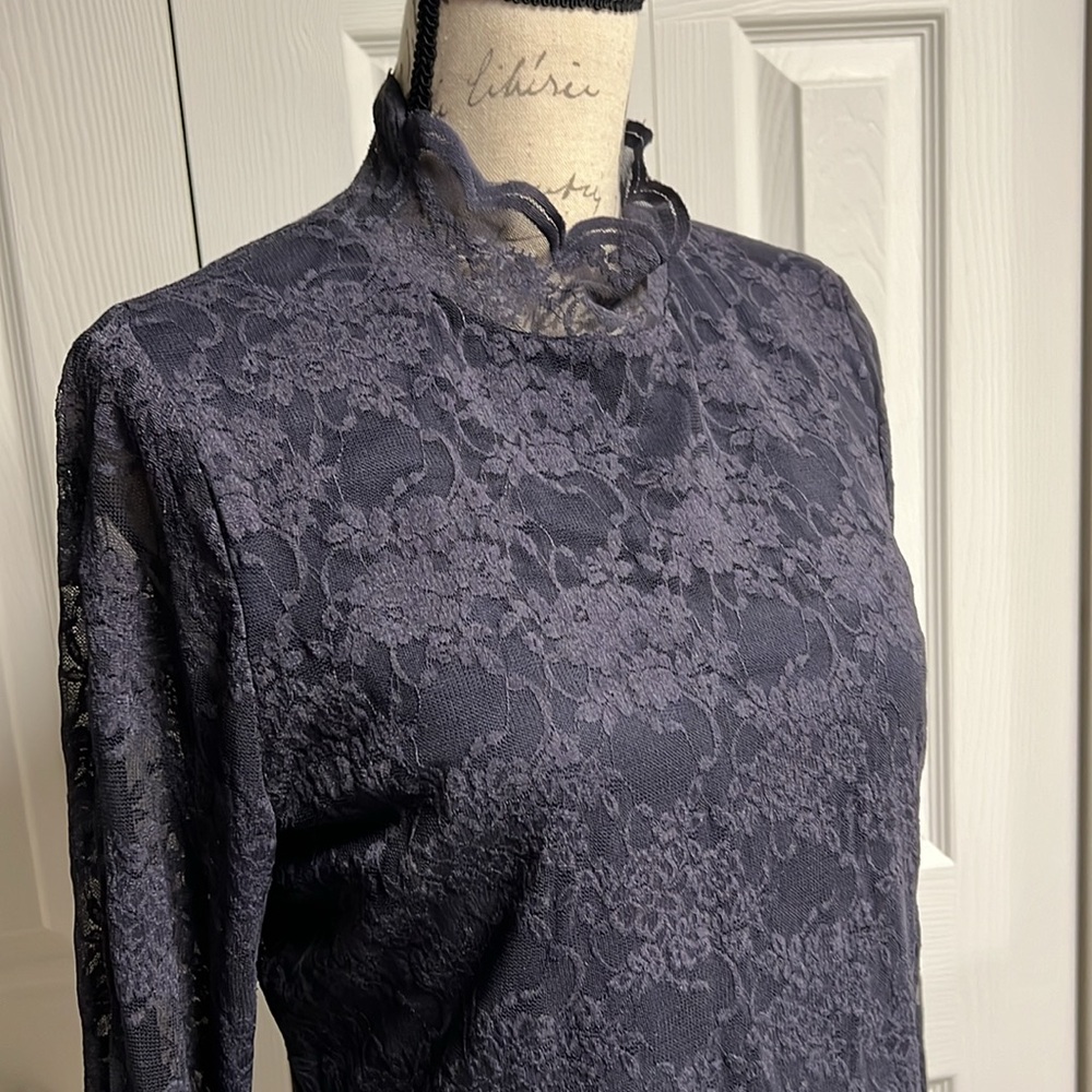 Vince Camuto beautiful lace bell sleeve blouse.